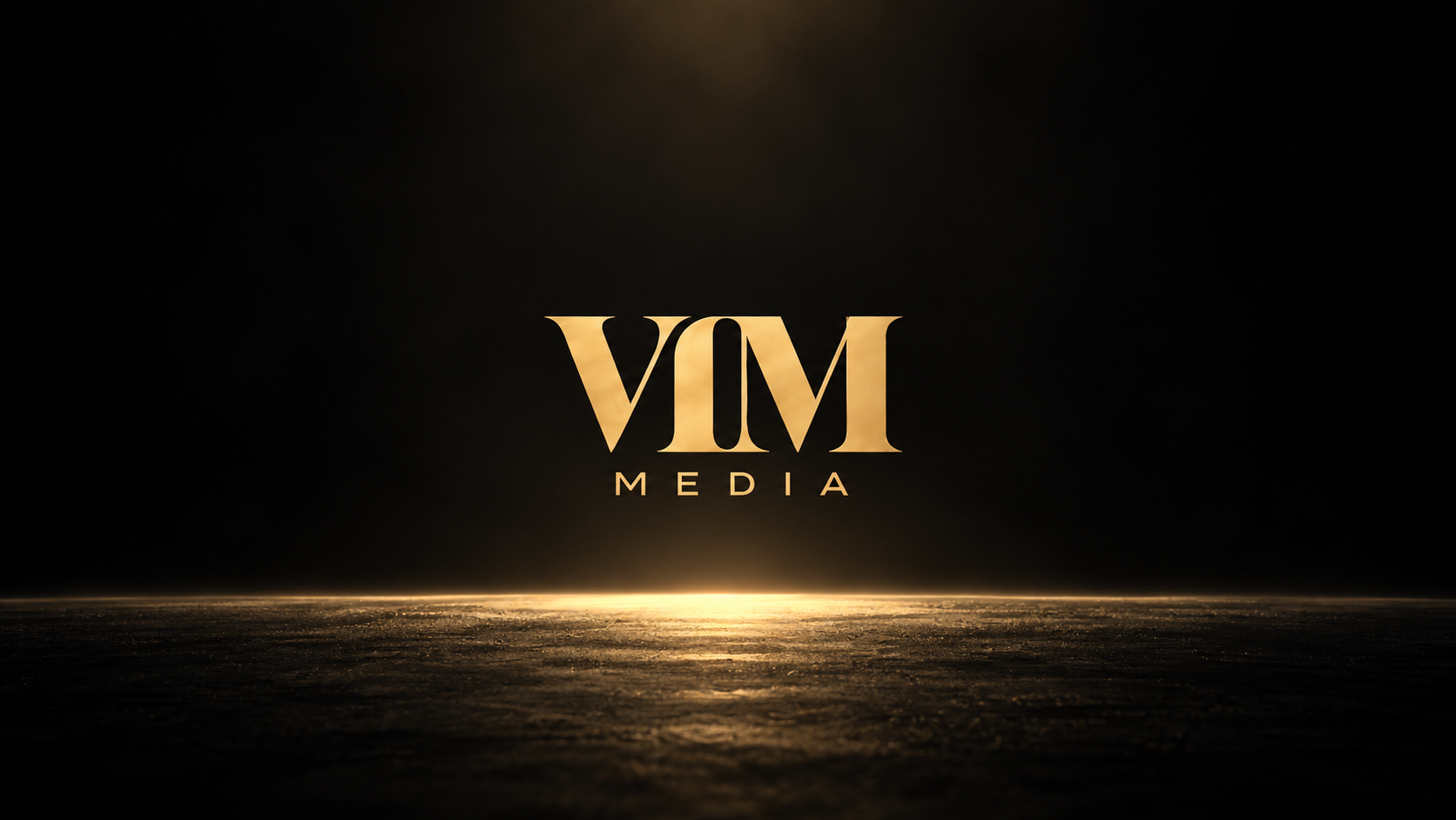 The VIM Media logo in cinematic gold above a glowing horizon